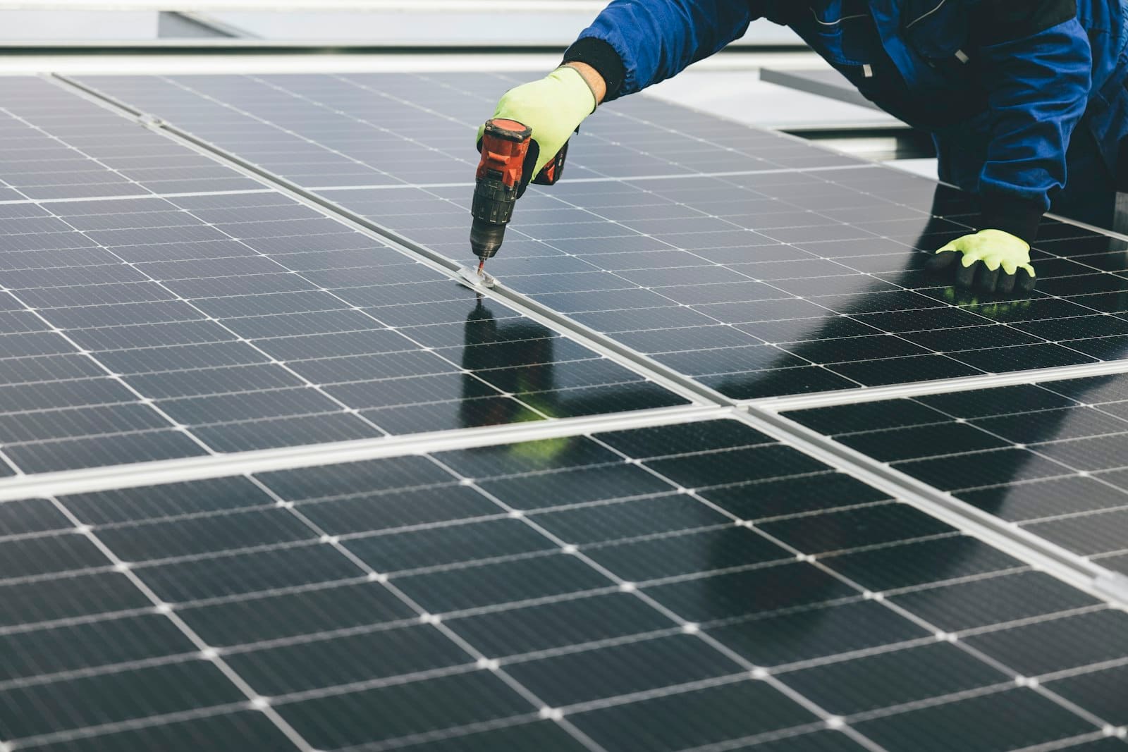 Engineer installing solar panels